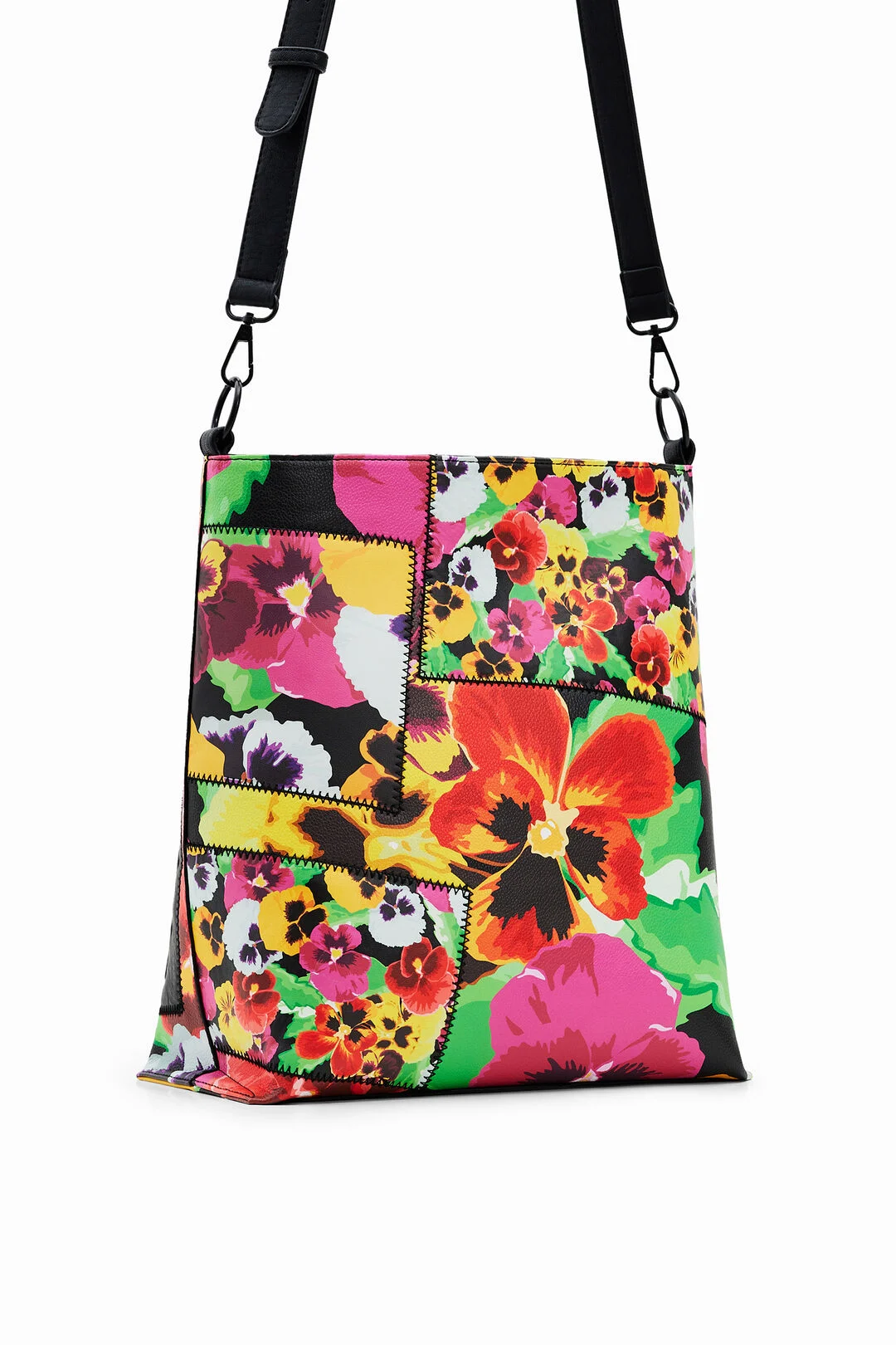Parte trasera del bolso bandolera Desigual Mika Butan Floral multicolor para mujer con estampado floral patchwork y correa ajustable.