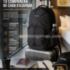 Mochila Columbia negra 25L para viaje corto, escapada y equipaje de mano Mochila Columbia negra unisex 25L sobre maleta en habitación de hotel con portátil, pasaporte, libreta y botella, ideal para viaje corto, escapadas, equipaje de mano, trabajo y uso diario.