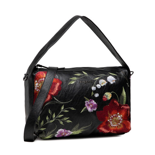 Bolso negro con flores bordadas rojas y lilas visto de frente, con asa y correa bandolera ajustable.