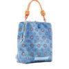 Mochila Desigual Back Dejavu Sunny azul con flores troqueladas modelo 24SAKP09