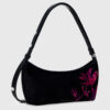 Bolso Desigual Reprise Lilia Alsacia negro con flores fucsia bordadas para mujer elegante y práctica