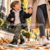Niño con zapatillas adidas Hoops Mid 2.0 K EE6704 negras en otoño