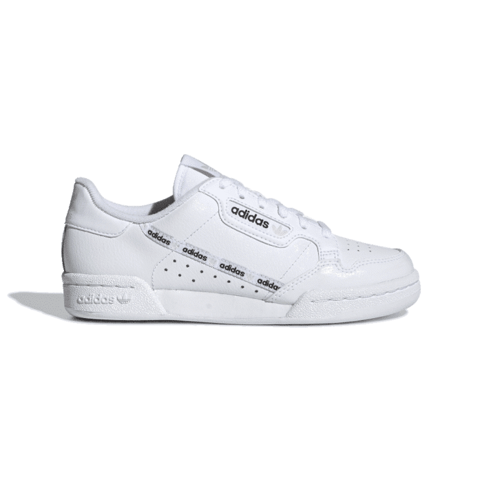 Zapatillas Adidas Continental 80 J blancas con detalles en rojo y azul marino, estilo retro clásico. Vista lateral sobre fondo claro, suela de goma Continental y diseño limpio para uso diario.