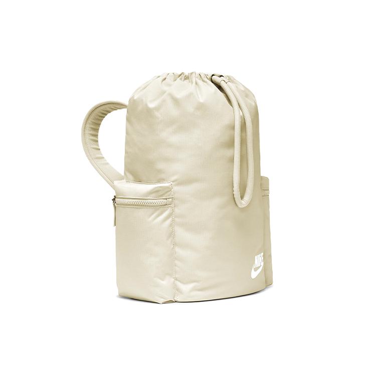 Vista lateral mochila Nike Heritage Beige BA6150-104 con bolsillo exterior