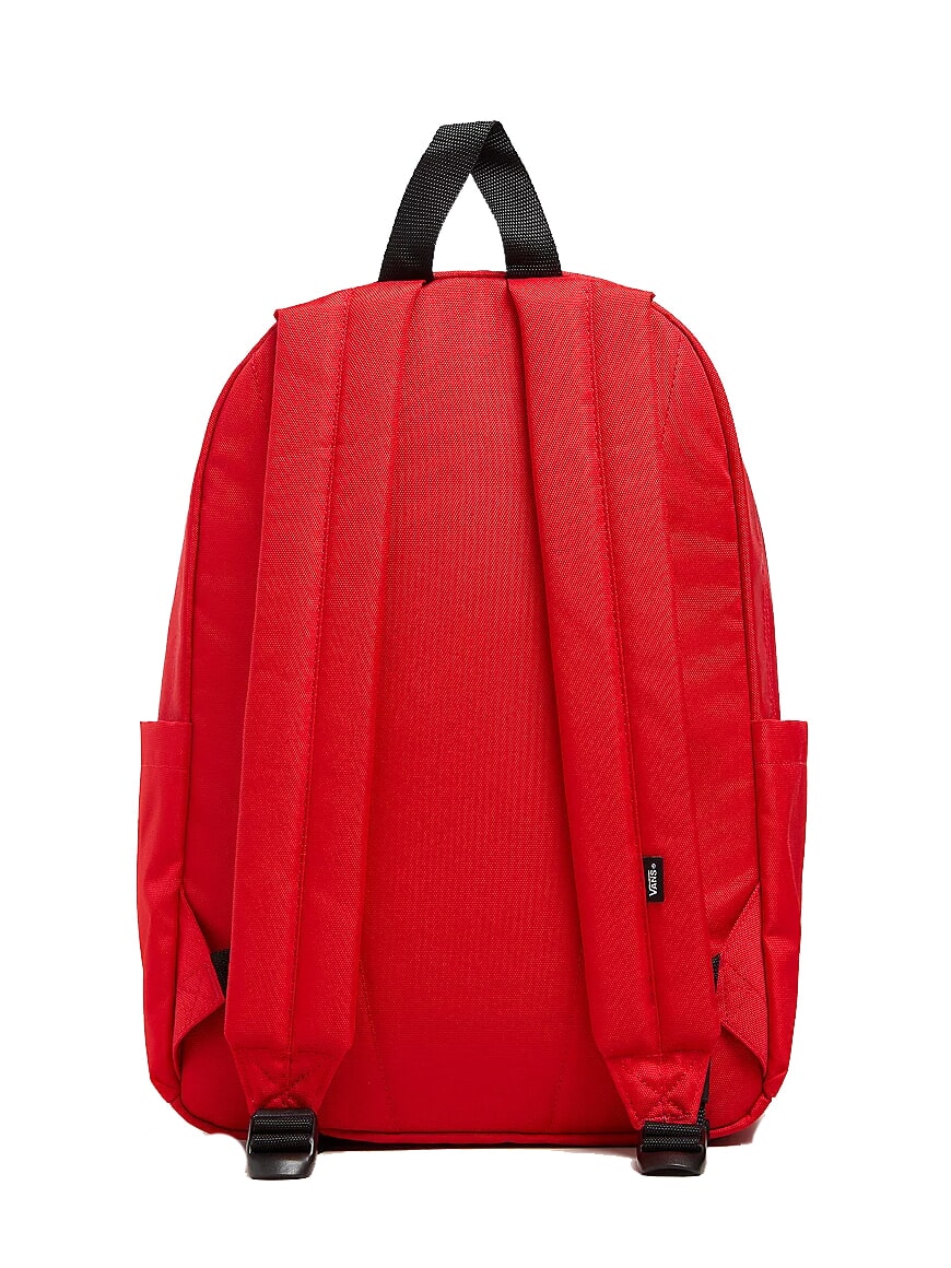 Parte trasera de la mochila Vans Old Skool Grom roja con correas ajustables para hombros y asa superior negra.