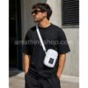 Hombre con bolso bandolera Nike Air Jordan Crossbody blanco original de uso urbano y estilo streetwear