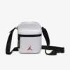 Bolso bandolera Jordan blanco unisex Airborne Festival con correa ajustable y logo Jumpman rojo