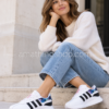 Adidas SL Andridge FX8105 mujer blancas con detalle floral en look casual
